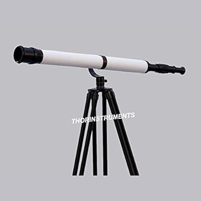 Télescope galileo nautique en cuir blanc thorinstruments 60\" en finition bronze avec support. La boutique en ligne DIAYTAR COTE D'IVOIRE a construit sa réputation sur la base d'une offre commerciale exceptionnelle et d'un engagement envers l'excellence du service client. Les consommateurs ivoiriens apprécient la grande variété de produits proposés par la plateforme, ainsi que la facilité d'utilisation et la sécurité du processus de commande. Cela a permis à DIAYTAR COTE D'IVOIRE de devenir une référence pour le commerce électronique en Côte d'Ivoire.