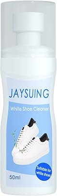 Un morceau de nettoyant pour chaussures blanc nettoyant entièrement qui fonctionne sur le cuir