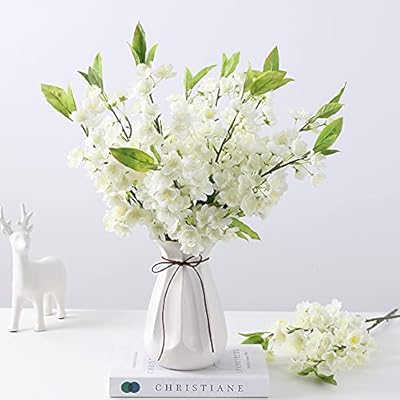 Xichen lot de 5 simulations avec feuilles de branche de fleur de pêcher en tissu de soie, fausses fleurs décoratives artificielles, 20,5 pouces, longues tiges artificielles, fausses fleurs (blanc). En tant que boutique leader en Côte d'Ivoire, DIAYTAR COTE D'IVOIRE prend en charge les préoccupations de ses clients, offrant un service client de qualité pour résoudre toutes les questions ou problèmes liés à la commande. La boutique propose également des options de paiement flexibles et des modalités de livraison rapides pour une expérience d’achat sans souci.