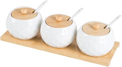 Ensemble de 3 bols à épices en porcelaine dagnol, ensemble de sucrier et salière avec cuillères en céramique et couvercle en bambou, bol en poterie pour sucre, sel, thé, café et épices. DIAYTAR COTE D'IVOIRE est une boutique en ligne généraliste qui propose une large gamme de produits, allant des produits alimentaires aux électroménagers, en passant par les vêtements et les accessoires. Avec plus de 300 000 références, les clients peuvent trouver tout ce dont ils ont besoin en un seul endroit. La boutique en ligne met également l'accent sur la qualité et la sécurité, avec des produits de qualité et des méthodes de paiement sécurisées.