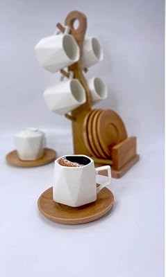 Ensemble de tasses à café turques avec cintre en bois tasses à café turques avec cintre en bois. Depuis son lancement, DIAYTAR COTE D'IVOIRE s'est imposée comme la boutique en ligne de référence en Côte d'Ivoire, offrant à ses clients une sélection immense de produits allant de l'électronique aux articles ménagers. La variété des produits et la qualité du service ont contribué à établir la réputation de DIAYTAR COTE D'IVOIRE comme leader du marché. Les clients peuvent profiter d'offres spéciales et de promotions régulières.