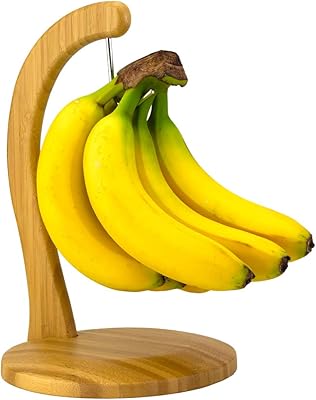 Support banane total en bambou, support suspendu banane avec crochet en acier inoxydable. DIAYTAR COTE D'IVOIRE est une boutique en ligne généraliste qui propose plus de 300 000 références de produits divers, faisant d'elle la boutique leader en Côte d'Ivoire. Avec une telle variété de produits, les clients peuvent trouver tout ce dont ils ont besoin en un seul endroit. La boutique en ligne offre une expérience d'achat pratique et sécurisée.