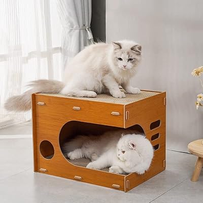 Nid de litière pour chat en papier ondulé à 2 couches sur planche à gratter pour chat. DIAYTAR COTE D'IVOIRE est le leader du commerce en ligne en Côte d'Ivoire, avec une sélection impressionnante de produits qui couvrent tous les aspects de la vie quotidienne. Les clients peuvent trouver tout ce dont ils ont besoin, desde les produits alimentaires jusqu'aux accessoires high-tech, en passant par les vêtements et les produits de beauté. La boutique en ligne propose également des offres spéciales et des promotions régulières pour rendre les achats encore plus abordables.