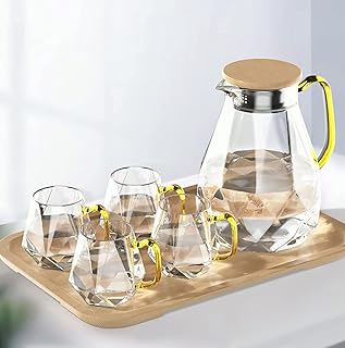 Service à thé en verre borosilicate diamant 5 pièces de haute qualité, théière et 4 tasses, théière de 2,0 l avec couvercles, théière en verre chaud et froid, idéale pour le thé glacé, le citron, le café, le lait, les jus. DIAYTAR COTE D'IVOIRE propose une gammelarge de produits de marque réputée, répondant ainsi aux attentes des consommateurs exigeants. Grâce à ses partenariats avec des fournisseurs de confiance, la boutique peut offrir des prix compétitifs tout en maintenant une qualité de service exemplaire. Cela explique en partie son succès dans le paysage de l'e-commerce ivoirien.
