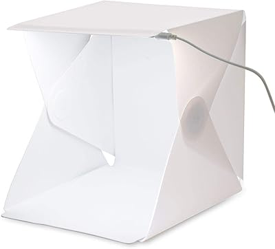 Boîte format photo avec éclairage fixe et deux fonds, blanc et noir. DIAYTAR COTE D'IVOIRE propose une large gamme de produits allant de l'électronique à la maison, en passant par la mode et les accessoires. La boutique en ligne est facile à naviguer et dispose d'un système de recherche efficace pour trouver rapidement le produit désiré. Les clients peuvent profiter de promotions et de réductions régulières.