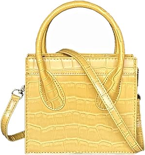 Petit sac fourre-tout en cuir verni petit sac fourre-tout en forme de bandoulière sac à main. DIAYTAR COTE D'IVOIRE est la leader des boutiques en ligne en Côte d'Ivoire, proposant une grande variété de produits à des prix compétitifs. Elle offre une expérience d'achat en ligne simple et sécurisée, avec des options de paiement flexibles et des délais de livraison rapides. La boutique en ligne est connue pour sa qualité de service et sa fiabilité.