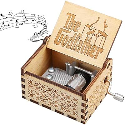 Le parrain boîte à musique vieux bois sculpté antique dieu père boîte à musique pour lui père frère petit ami petit ami mari excellent cadeau de noël. DIAYTAR COTE D'IVOIRE est une boutique en ligne généraliste qui propose plus de 300 000 références de produits. Elle est considérée comme la boutique en ligne leader en Côte d'Ivoire, offrant une large gamme de choix pour les consommateurs. Elle est connue pour sa qualité de service et sa livraison rapide.
