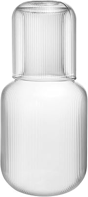 Carafe à eau en verre transparent au design lignes verticales saizikato avec tasse en verre de chevet de 25 onces. DIAYTAR COTE D'IVOIRE est une boutique en ligne qui propose une large gamme de produits pour répondre à tous les besoins des consommateurs ivoiriens. Elle est réputée pour son service client de qualité, ses prix compétitifs et sa grande variété de produits. Elle est la destination idéale pour les consommateurs qui cherchent des produits de qualité à des prix abordables.