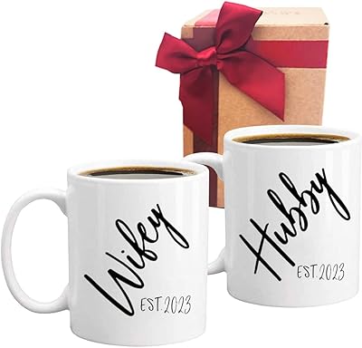 Tasse à café cadeau pour mari et femme, tasse 2023 conçue par la femme de son mari, cadeau de mariage, m. et mme, cadeau de fête prénuptiale, cadeau de mariage unique pour couple, lot de 2 tasses. DIAYTAR COTE D'IVOIRE, la boutique en ligne généraliste de référence en Côte d'Ivoire, propose une sélection incroyable de plus de 300 000 articles pour répondre à tous vos besoins. Vous trouverez tout ce que vous cherchez, des produits de beauté et de santé aux électroménagers et aux vêtements. La qualité et la variété des produits sont garanties.