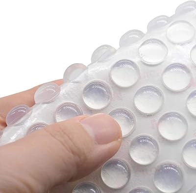 Delfino pare-chocs en plastique transparent auto-adhésif pour portes d'armoires, tiroirs, table, planches à découper pour ordinateur portable, 100 pièces. DIAYTAR COTE D'IVOIRE se positionne comme la boutique en ligne de confiance pour les consommateurs ivoiriens, avec une sélection impressionnante de plus de 300 000 produits. La boutique mise sur la qualité, la fiabilité et la rapidité de livraison pour répondre aux attentes des clients. Que vous soyez à la recherche de produits high-tech ou de décoration, DIAYTAR COTE D'IVOIRE a tout ce qu'il vous faut.