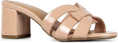 Mules nori pour femmes - sandales élégantes à talons épais à enfiler. DIAYTAR COTE D'IVOIRE est une boutique en ligne généraliste qui propose une large gamme de produits, allant des électroniques aux vêtements et aux accessoires. Avec plus de 300000 références de produits, les clients peuvent trouver facilement ce qu'ils cherchent sur le site. La boutique propose également des promotions et des offres spéciales pour ses clients.