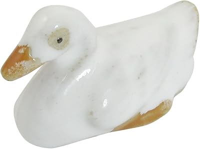 Zhuidjo aquarium décoratif en forme de canard en céramique blanche (sn : b12 b4e c72 839 2ad). DIAYTAR COTE D'IVOIRE est une boutique en ligne généraliste qui propose plus de 300 000 références de produits, répondant ainsi aux besoins divers des consommateurs ivoiriens. En tant que leader du marché en Côte d'Ivoire, elle offre une vaste gamme de produits allant des articles ménagers aux accessoires de mode. La satisfaction du client est au cœur de ses priorités.