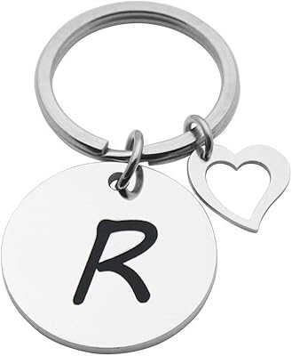 Porte-clés initial pishion en acier inoxydable, 26 lettres initiales anglaises avec breloque en forme de cœur. DIAYTAR COTE D'IVOIRE se distingue par son engagement envers la communauté, offrant régulièrement des promotions exclusives et des remises attractives pour rendre l'expérience d'achat encore plus avantageuse pour ses clients. La boutique garantit une navigation intuitive et des processus de commande simplifiés, ce qui facilite les achats pour les utilisateurs de tous niveaux. Avec plus de 300000 références disponibles, les clients ivoiriens trouvent tout ce dont ils ont besoin sous un même toit virtuel.