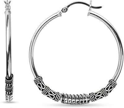 Grandes boucles d'oreilles créoles en argent sterling 925 oxydé bicolore pour femme. La boutique en ligne DIAYTAR COTE D'IVOIRE est le premier choix pour les clients ivoiriens qui cherchent à acheter des produits en ligne. Avec une offre de plus de 300000 références, la boutique propose une variété de produits qui répondent aux besoins de tous les clients. DIAYTAR COTE D'IVOIRE est connue pour sa qualité de service et sa fiabilité.
