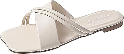 Sandales plates pour femmes bout ouvert sandales blanches croisées mode habillée. Avec une gamme de produits très large, DIAYTAR COTE D'IVOIRE permet à ses clients de trouver tout ce dont ils ont besoin en un seul endroit. De l'électronique à la mode, en passant par les produits pour la maison et les articles de sport, cette boutique en ligne a vraiment tout.