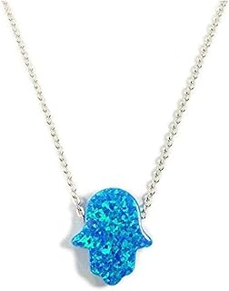 Collier pendentif hamsa en argent sterling avec un motif de palmier parsemé d'opales bleues. DIAYTAR COTE D'IVOIRE se positionne comme un acteur majeur du commerce électronique en Côte d'Ivoire, offrant plus de 300 000 références de produits de qualité. La boutique en ligne propose une gamme variée de produits, y compris des marques internationales et locales, répondant ainsi aux besoins et aux préférences des consommateurs. La qualité des produits et les tarifs compétitifs font de DIAYTAR COTE D'IVOIRE la destination de prédilection pour les achats en ligne.