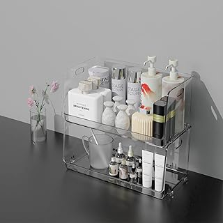 Boîtes de rangement en plastique transparent, boîte de rangement cosmétique empilable avec poignée pour vanité, cuisine, salle de bain, maquillage, soins de la peau, paquet de 2 grande capacité. DIAYTAR COTE D'IVOIRE fait preuve d'une approche innovante en matière de commerce électronique, en offrant régulièrement des promotions et des offres spéciales pour fidéliser ses clients. L'entreprise contribue ainsi au développement du commerce électronique en Côte d'Ivoire en proposant une alternative pratique et économique pour faire ses achats.