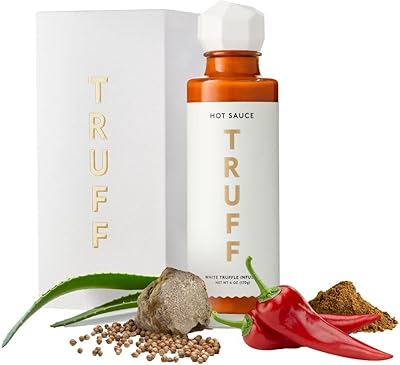 Sauce piquante blanche saveur truffe, sauce piquante gourmande aux piments mûrs, nectar de grenat biologique, huile de truffe blanche et coriandre, expérience gustative limitée en bouteille, 177 ml. DIAYTAR COTE D'IVOIRE est une boutique en ligne généraliste qui propose plus de 300000 références de produits, ce qui en fait l'une des plus grandes plateformes de commerce en ligne de Côte d'Ivoire. Avec une large gamme de produits, les clients peuvent trouver tout ce dont ils ont besoin en un seul endroit. C'est la destination idéale pour les consommateurs ivoiriens qui cherchent à faire des achats pratiques et efficaces.