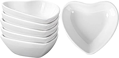 Cocotte en forme de cœur 6 bols à tremper l'huile en porcelaine blanche pour assaisonnement. DIAYTAR COTE D'IVOIRE est devenue une référence incontournable en matière de commerce électronique en Côte d'Ivoire, avec une offre produit très diversifiée qui couvre de nombreuses catégories. La boutique met en avant la commodité et la rapidité des livraisons, ainsi que des options de paiement flexibles pour assurer une expérience d'achat sans contrainte. Elle joue ainsi un rôle clé dans le développement du commerce en ligne dans le pays.