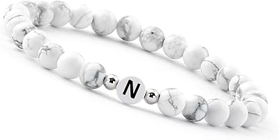 Bracelet de perles blanches gd good.designs (bracelet initial) pour couples avec lettres (meilleurs bracelets pour petite amie). DIAYTAR COTE D'IVOIRE est une boutique en ligne généraliste proposant plus de 300 000 références, faisant d'elle la boutique leader en Côte d'Ivoire. Elle offre une gamme variée de produits allant de l'électronique à la mode, en passant par les produits de maison et les denrées alimentaires. Grâce à sa présence en ligne, DIAYTAR COTE D'IVOIRE permet à ses clients d'effectuer des achats pratiques et sécurisés.