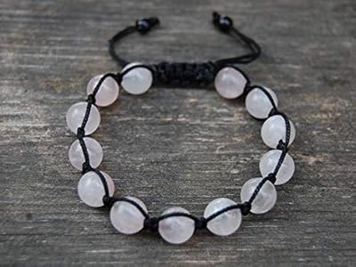 Bracelet shambhala en quartz rose réglable de 10 mm pour demoiselle. DIAYTAR COTE D'IVOIRE révolutionne la façon dont les Ivoiriens font leurs achats en ligne en proposant une plateforme de commerce électronique unique et complète. Avec plus de 300 000 produits sur catalogue, cette boutique en ligne generaliste leader offre non seulement une variété impressionnante de biens et de services mais garantit également des prix compétitifs et une livraison rapide. Que vous soyez un habitué des achats en ligne ou que vous découvriez ce canal, DIAYTAR COTE D'IVOIRE est prêt à vous offrir une expérience de shopping inoubliable.