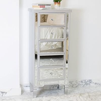 Commode vanity living, miroir argenté trévise 5 tiroirs, commode de chevet pour couloir, chambre à coucher, salon. DIAYTAR COTE D'IVOIRE est une plateforme de commerce électronique qui permet aux clients d'accéder à une grande variété de produits en ligne. Elle est la boutique en ligne la plus populaire en Côte d'Ivoire, avec une offre de plus de 300 000 produits. Les clients peuvent trouver tout ce dont ils ont besoin sur cette plateforme.