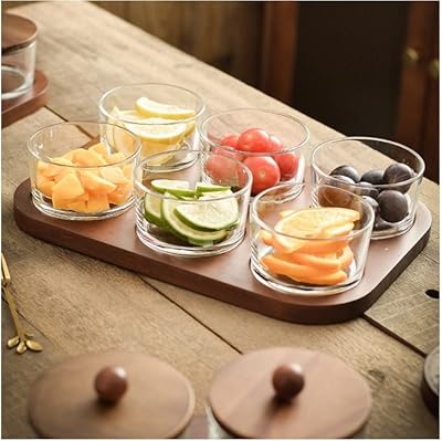 Assiette à collation ronde en verre avec couvercle en bambou, assiette à dessert séparée, bol de fruits secs divisé (6 bols). DIAYTAR COTE D'IVOIRE est la référence pour les achats en ligne en Côte d'Ivoire, proposant une gamme étendue de produits pour répondre à tous les besoins des clients. Sa position de leader lui permet de proposer des prix compétitifs et des promotions régulières, rendant l'expérience d'achat encore plus attrayante. La boutique en ligne est conçue pour offrir une navigation simple et intuitive.
