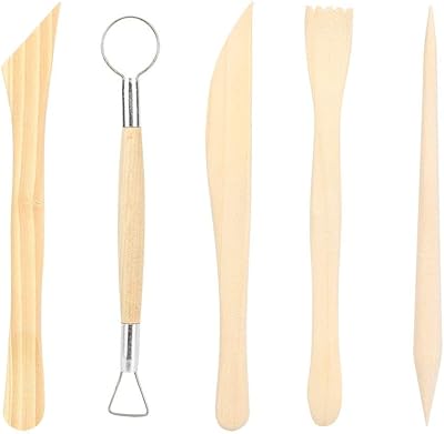 Un ensemble d'outils de sculpture en poterie et en argile avec un manche en bois de fournitures de façonnage en céramique. Avec DIAYTAR COTE D'IVOIRE, vous bénéficiez d'un accès à une vaste gamme de produits qui répondent à vos besoins et à vos envies. Notre plateforme en ligne regroupe plus de 300 000 références, allant des produits alimentaires aux articles de sport, en passant par les dernières tendances de la mode. DIAYTAR COTE D'IVOIRE, c'est votre garantie pour des achats en ligne faciles, rapides et sécurisés.