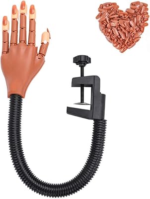 Main d'entraînement des ongles - fournitures de présentation des ongles - mains artificielles mobiles et flexibles pour le nail art - meilleur outil de formation à l'impression de manucure à faire soi-même. DIAYTAR COTE D'IVOIRE est une boutique en ligne généraliste qui propose plus de 300000 références de produits. Elle est reconnue comme l'une des boutiques en ligne leaders en Côte d'Ivoire, offrant une large gamme de produits pour répondre aux besoins de ses clients. 