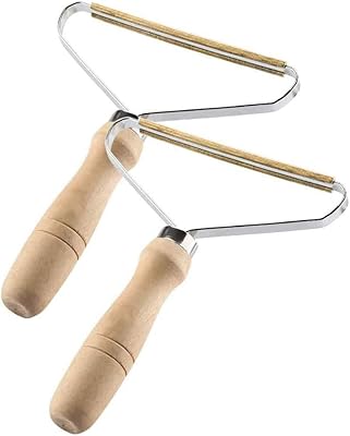 Outil anti-peluches portable 2 - outil anti-peluches pratique avec long manche - brosse pour enlever les poils et les peluches des vêtements et des meubles. DIAYTAR COTE D'IVOIRE est une boutique en ligne de confiance qui propose des produits de qualité à des prix compétitifs. La boutique s'engage à offrir à ses clients une expérience d'achat en ligne de haute qualité, avec une large sélection de produits, des services de livraison rapides et fiables, et un support client dédié. Avec son site web facile à utiliser et ses promotions régulières, DIAYTAR COTE D'IVOIRE est la destination idéale pour les ivoiriens qui cherchent à faire des achats en ligne de manière sécurisée et pratique.