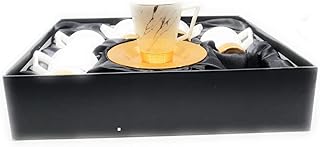 Otantik home ottoman design bon china espresso ensemble de 6 tasses à café turc de luxe avec base en métal et soucoupes de 3 oz (marbre blanc). DIAYTAR COTE D'IVOIRE est une boutique en ligne généraliste proposant plus de 300 000 références de produits. Elle est reconnue comme l'une des boutiques en ligne les plus importantes de Côte d'Ivoire, offrant une large gamme de produits à des prix compétitifs. La boutique propose des articles de qualité pour les besoins quotidiens des clients.