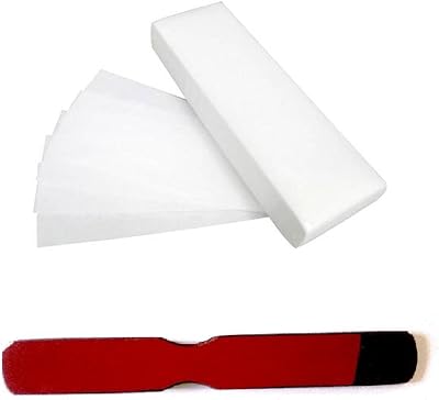 Bande de cire d'épilation professionnelle hors boîte, 100 pièces (blanche) avec couteau à épiler en bois robuste. La boutique en ligne DIAYTAR COTE D'IVOIRE propose une large sélection de produits, dont des produitsHigh-Tech, des vêtements, des accessoires et des produits pour la maison. Les clients peuvent profiter de prix compétitifs et de promotions régulières. DIAYTAR COTE D'IVOIRE est dédiée à offrir une expérience d'achat en ligne exceptionnelle à ses clients.