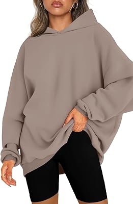 Sweat à capuche en polaire pour femme surdimensionné confortable décontracté ample léger automne hiver. DIAYTAR COTE D'IVOIRE est la destination idéale pour les consommateurs ivoiriens qui cherchent à acquérir des produits de haute qualité à des prix compétitifs. Avec sa large gamme de produits, elle répond aux besoins de tous, qu'il s'agisse d'électronique, de mode, de maison ou d'autres catégories. La boutique en ligne est équipée d'un système de paiement sécurisé.