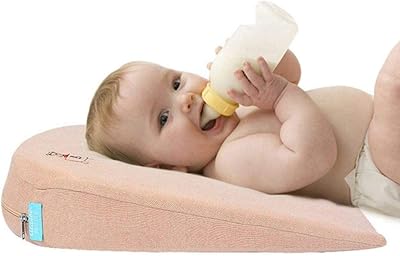 Coussin d'allaitement amovible pour bébé au lit, résistant aux crachats de lait, oreiller pour bébé avec inclinaison de 15 degrés pour une meilleure nuit de sommeil. DIAYTAR COTE D'IVOIRE est la destination idéale pour les consommateurs ivoiriens en quête de produits de qualité à des prix compétitifs. Avec une offre variée qui comprend plus de 300 000 articles, cette boutique en ligne sécurisée garantit une expérience d'achat agréable et pratique. Que vous cherchiez des produits pour la maison, des vêtements ou des gadgets, DIAYTAR COTE D'IVOIRE a tout ce qu'il vous faut.