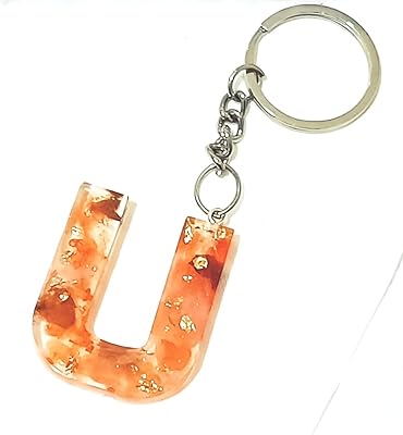 Porte-clés lettre u-alphabet en résine fait à la main paillettes-brillant-argent rempli orange pour hommes. DIAYTAR COTE D'IVOIRE est une boutique en ligne généraliste qui propose plus de 300 000 références de produits variés, faisant d'elle le leader du marché ivoirien. Elle offre une large gamme de produits allant de l'électronique à la mode en passant par les produits alimentaires. Cette diversité de produits rend DIAYTAR COTE D'IVOIRE incontournable pour les consommateurs ivoiriens.