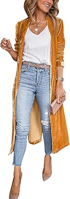 Veste cardigan longue en velours pour femme avec col à revers et devant. DIAYTAR COTE D'IVOIRE est une boutique en ligne généraliste proposant plus de 300 000 références de produits divers, faisant d'elle le leader du marché ivoirien. Avec une gamme étendue de produits allant de l'électronique à la mode, en passant par les produits de maison et les articles de sport, DIAYTAR répond à tous les besoins de ses clients. Cela en fait un incontournable pour les consommateurs ivoiriens.