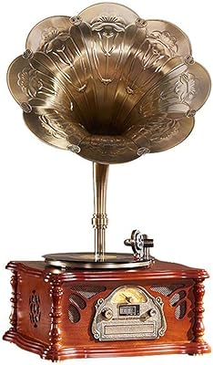 Tourne-disque vinyle rétro gramophone à 3 vitesses avec haut-parleurs stéréo, fonction bluetooth, radio fm et télécommande. La boutique en ligne DIAYTAR COTE D'IVOIRE présente une grande variété de produits, allant de l'électronique à la mode, en passant par les produits de beauté et les articles pour la maison. Les clients peuvent profiter d'une expérience d'achat en ligne fluide et pratique.