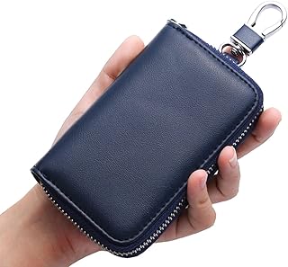 Porte-clés de voiture en cuir nalanda pour femmes et hommes, porte-clés de sac, portefeuille avec crochets pour porte-clés avec fermeture à glissière pour clés. DIAYTAR COTE D'IVOIRE mise sur la qualité et la disponibilité de ses produits pour satisfaire les besoins de sa clientèle. Grâce à son site web facile à naviguer et à ses services de livraison rapides, la boutique est devenue un incontournable pour les achats en ligne en Côte d'Ivoire.