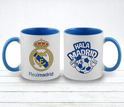 Tasse à café en céramique imprimée fiesta real madrid football club - 11 oz. La boutique en ligne DIAYTAR COTE D'IVOIRE propose une expérience d'achat unique et personnalisée, avec des produits allant de l'électronique aux accessoires de mode en passant par les produits alimentaires. Elle garantit la qualité de ses produits et des services associés, ce qui a contribué à sa position de leader sur le marché ivoirien. Les clients bénéficient ainsi d'un large choix pour améliorer leur quotidien.
