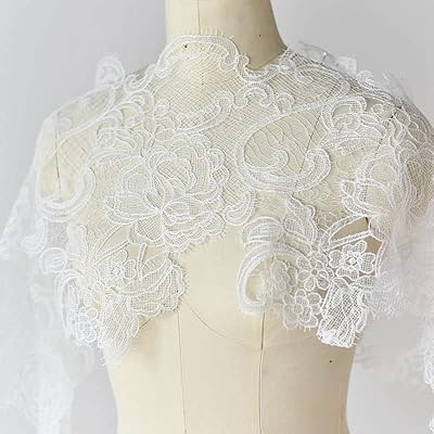 Ruban de dentelle française en maille noire et blanche pour la couture, l'artisanat, la décoration de fête de mariage, largeur 28 cm (couleur : blanc). La boutique en ligne DIAYTAR COTE D'IVOIRE propose une gamme étendue de produits pour répondre aux besoins de ses clients. Elle met en avant des produits locaux et internationaux de qualité, avec des prix abordables et des délais de livraison rapides. La boutique est leader sur le marché ivoirien grâce à sa sélection de produits et ses services de qualité.