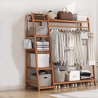 Portant à vêtements en bois avec étagères de rangement à 5 couches, portant à vêtements trapézoïdal multifonctionnel, portant à vêtements autoportant pour chambre à coucher et salon. DIAYTAR COTE D'IVOIRE est une plateforme de commerce électronique innovante qui permet aux clients de faire des achats en ligne en toute sécurité et rapidité. Avec sa politique de retour et d'échange flexible, les clients peuvent acheter avec confiance. La boutique en ligne propose également des promotions régulières pour aider les clients à économiser de l'argent.