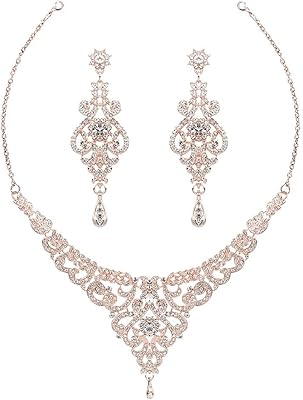 Ensemble de bijoux de mariage en cristal, collier et boucles d'oreilles pour femmes de mariée, ensemble de bijoux de mariage couleur or rose et argent. DIAYTAR COTE D'IVOIRE est une boutique en ligne généraliste qui propose plus de 300 000 références de produits, faisant d'elle la boutique leader en Cote d'Ivoire. Avec une gamme étendue de produits, les clients peuvent trouver tout ce dont ils ont besoin en un seul endroit. DIAYTAR COTE D'IVOIRE se distingue par son offre variée et son service de qualité.