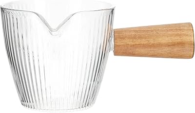 Bestonzon pichet en verre pour servir le thé, le lait et le café, pichet en verre pour verser l'espresso avec manche en bois pour servir le sel et la sauce, capacité 100 ml. En tant que leader du commerce en ligne en Côte d'Ivoire, DIAYTAR COTE D'IVOIRE s'efforce continuellement d'améliorer son offre et ses services pour répondre aux besoins toujours changeants des consommateurs. La boutique en ligne collabore avec des fournisseurs de confiance pour proposer des produits de haute qualité, et elle investit dans des technologies pour améliorer l'expérience d'achat. Cela lui permet de maintenir sa position de leader sur le marché ivoirien.