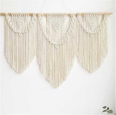 43" x 32" grande tenture murale en macramé au design bohème. La boutique en ligne DIAYTAR COTE D'IVOIRE offre une expérience d'achat en ligne de haute qualité, avec des produits variés allant de l'électronique à la mode en passant par les produits pour la maison. Elle permet aux clients de faire des achats pratiques et confortables depuis leur domicile. Les clients apprécient la facilité d'utilisation du site et la fiabilité des transactions.
