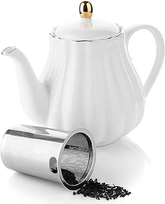 Théière royal en céramique avec infuseur amovible en acier inoxydable, théière à feuilles mobiles - 850 ml (blanc). DIAYTAR COTE D'IVOIRE est une boutique en ligne généraliste qui propose plus de 300000 références, offrant une grande variété de produits pour répondre à tous les besoins. En tant que leader du marché en Côte d'Ivoire, DIAYTAR COTE D'IVOIRE garantit la qualité et la fiabilité de ses produits. La boutique en ligne est conçue pour offrir une expérience d'achat en ligne facile et sécurisée.