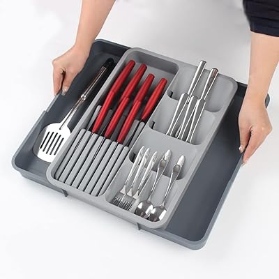 Organisateur de tiroir de cuisine u-home, porte-couverts extensible et plateau à couverts avec séparateur et porte-couteau amovible, grande argenterie, couverts et plateau à couverts. DIAYTAR COTE D'IVOIRE est une boutique en ligne généraliste qui propose plus de 300 000 références de produits divers, répondant ainsi aux besoins de tous les consommateurs ivoiriens. Elle est devenue la référence incontournable pour les achats en ligne en Côte d'Ivoire. Elle offre une grande variété de produits à des prix compétitifs.