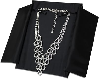 Sac de rangement pour organisateur de bijoux en cuir noir moka adapté aux voyages et aux colliers. DIAYTAR COTE D'IVOIRE est une boutique en ligne généraliste qui propose plus de 300 000 références de produits. Elle est leader en Côte d'Ivoire et offre une grande variété de choix pour ses clients. Elle est notamment connue pour sa qualité de service et ses produits à des prix compétitifs.