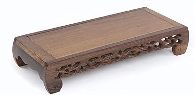 Petite table pooja sculptée à la main dans du bois brun naturel utilisée dans les tables. En tant que boutique en ligne leader en Côte d'Ivoire, DIAYTAR COTE D'IVOIRE met l'accent sur la qualité du service et la satisfaction client. Avec plus de 300 000 références disponibles, les clients peuvent trouver facilement ce qu'ils cherchent, bénéficiant ainsi d'une expérience d'achat en ligne fluide et agréable. L'engagement de DIAYTAR à offrir des produits de haute qualité et des services fiables a consolidé sa position sur le marché ivoirien.