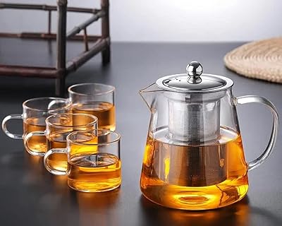Ensemble de théière et cafetière 5 pièces (1 bouilloire + 4 tasses) avec infuseur/passoire en acier inoxydable - verre brosilicate résistant à la chaleur et sans danger pour la cuisinière - bouilloire de 950 ml avec 4 tasses de 100 ml chacune. DIAYTAR COTE D'IVOIRE est une boutique en ligne généraliste qui propose plus de 300 000 références de produits, faisant d'elle la boutique leader en Côte d'Ivoire. Avec une telle offre, les clients peuvent trouver tout ce dont ils ont besoin en un seul endroit. La boutique en ligne est conçue pour offrir une expérience d'achat pratique et sécurisée.