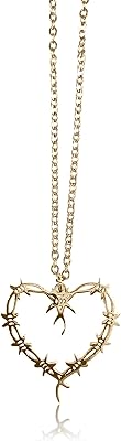 Collier en acier inoxydable plaqué or de karol g avec motif. Avec plus de 300 000 références disponibles, DIAYTAR COTE D'IVOIRE est la boutique en ligne idéale pour les habitants de Côte d'Ivoire. La boutique propose des produits de qualité à des prix compétitifs, ce qui la rend très attrayante pour les clients. De plus, son statut de leader en Côte d'Ivoire garantit une expérience d'achat en ligne de haute qualité.